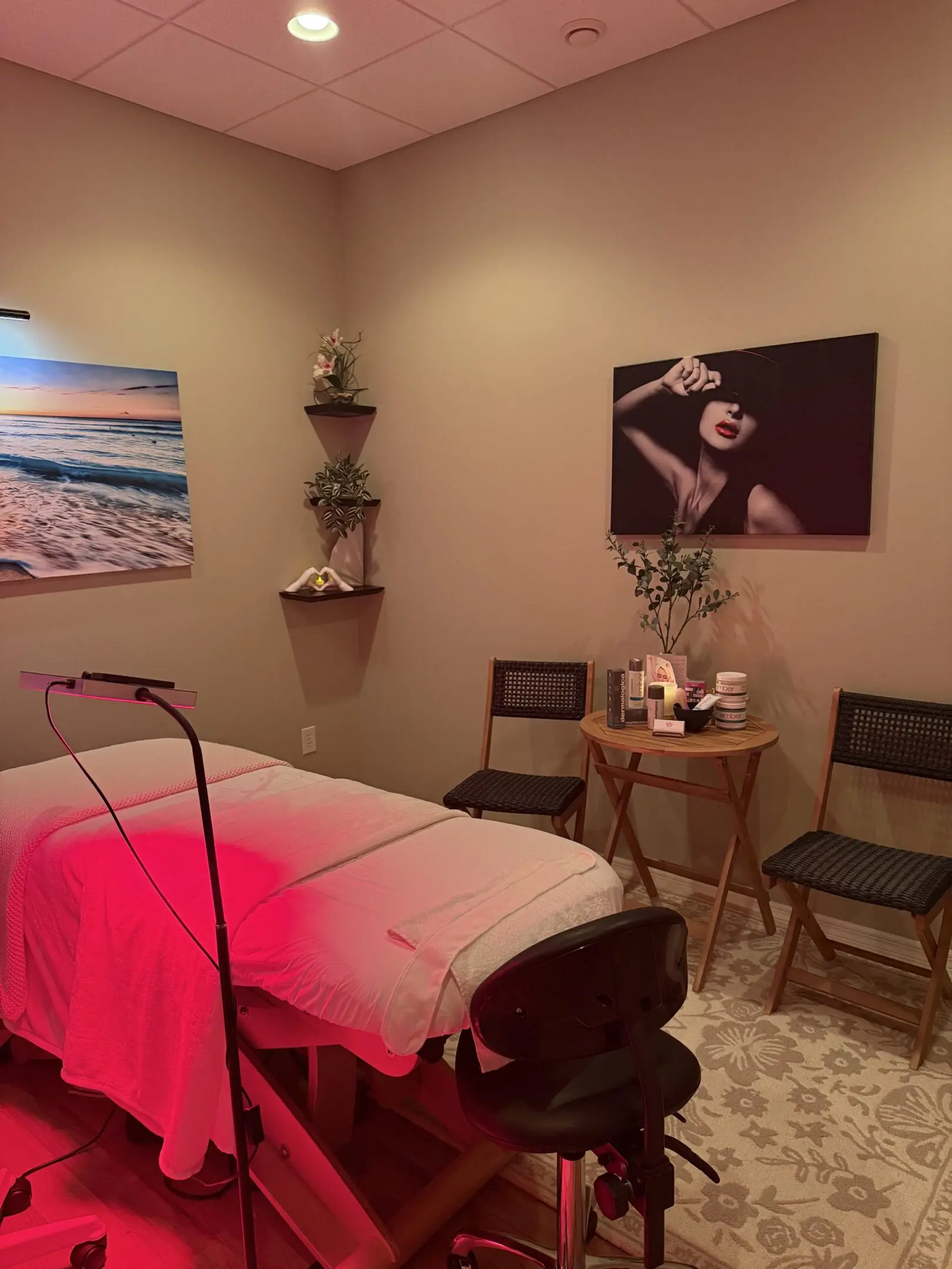 A room with two chairs and a bed