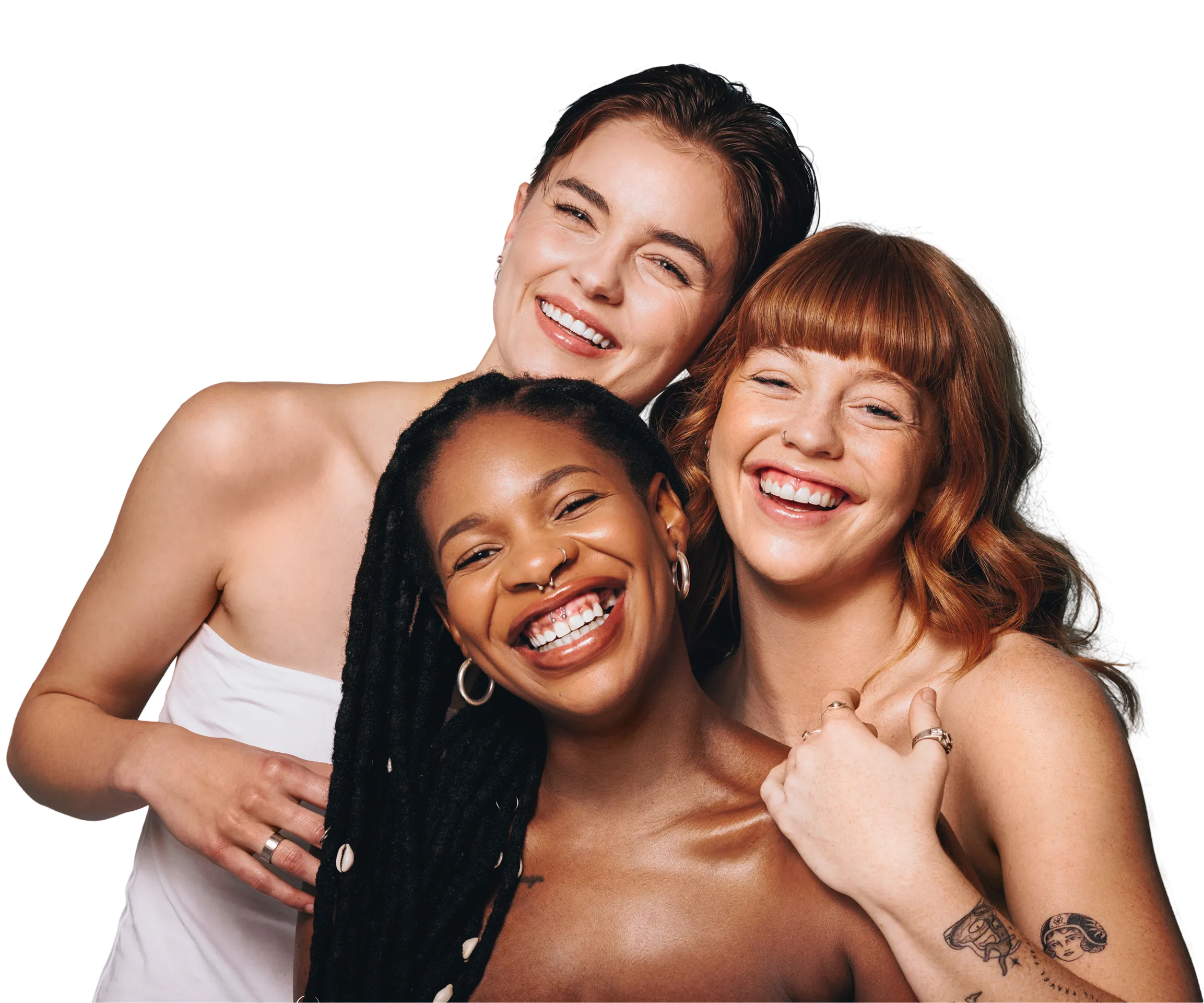 Three women smiling against a black background.